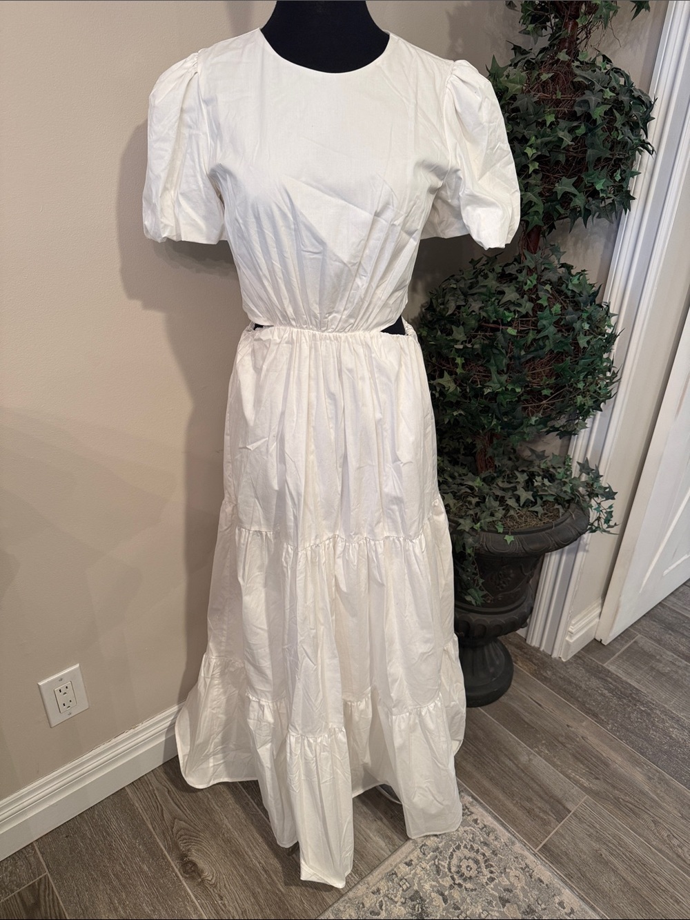 Wayf Plaza Cut Out Tiered Maxi Dress with a round neck and short puff sleeves.